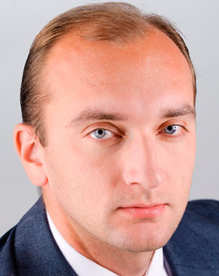 Преподавател Юрий